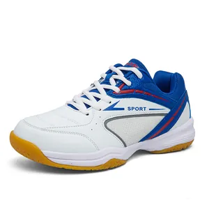 Professional white and blue badminton shoes for men and juniors with gum rubber sole.