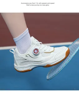 Detail of professional children's white breathable mesh badminton shoe on court.