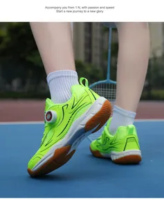 Close-up of neon green kids' badminton shoes with breathable mesh and dial laces