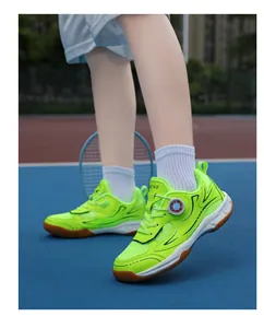 Detail shot of neon green breathable mesh badminton shoes for kids with rotary dial