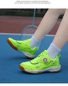 Professional neon green breathable mesh badminton shoes for children on sports court.
