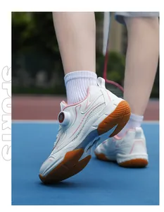 Detailed view of breathable children's badminton shoes with professional rotary lacing system
