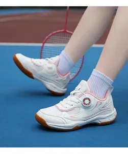 Breathable kids' badminton shoes with professional rotary buckle and mesh detail.