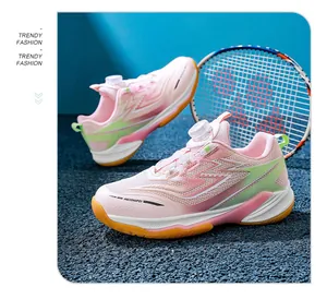 Detailed view of pink kids badminton shoes with convenient rotary buckle system