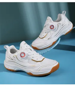 Detail view of white children's badminton shoes with breathable mesh and gum sole