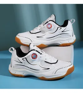Close-up detail of white children's badminton shoes featuring breathable mesh and dial lacing system