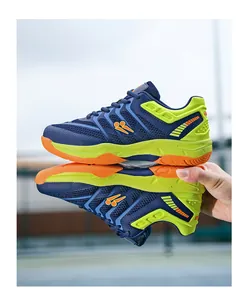 Lichtgewicht ademende blauwe en gele indoor badmintonschoenen voor heren en dames