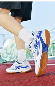 Macro detail of white and blue breathable athletic shoes for pickleball on a court