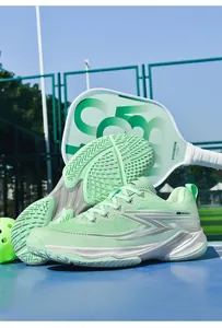Close-up of breathable mint green pickleball shoes featuring anti-slip rubber soles