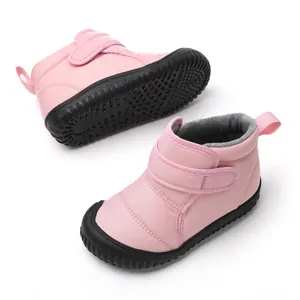 Bottes de neige roses chaudes pour enfants avec semelle antidérapante et polaire.
