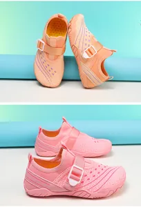 Detailed view of children's breathable mesh water shoes in pink and orange colors
