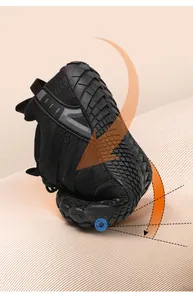 Detail showing the ultra-flexible soft sole of the black children's five-finger shoes