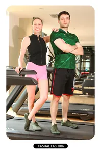 Männliche und weibliche Models tragen armeegrüne Fünf-Finger-Fitnessschuhe im Fitnessstudio