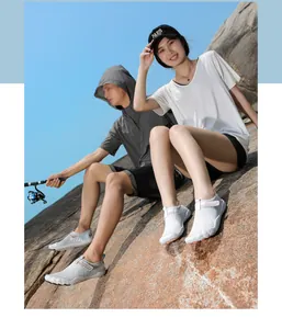 Outdoor barefoot water shoes for men and women worn during fishing on beach rocks