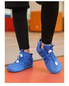 Close-up of children's royal blue barefoot fitness shoes for indoor gym and running