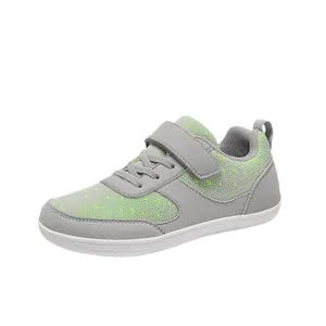 Grey kids wide-toe outdoor sneakers with breathable green mesh and Velcro strap