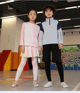 Children wearing lightweight quick-dry barefoot water shoes in an indoor play area