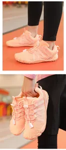 Details of orange minimalist barefoot kids shoes for indoor sports and gym training