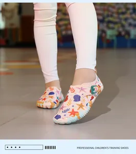 Detailed view of children's non-slip quick-dry aqua shoes with vibrant ocean patterns