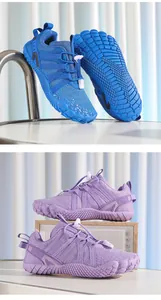 Professional blue and purple barefoot sports shoes for kids featuring non-slip textured soles