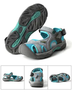 Detailed view of women's gray and blue closed-toe wading sandals from multiple angles.