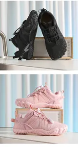 Children's breathable barefoot sports shoes in pink and black variants with soft soles