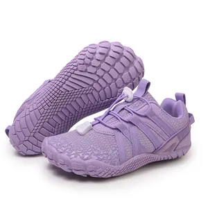Purple indoor non-slip sports shoes for children with soft shock-absorbing soles.