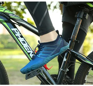 Detail view of navy blue quick-dry water shoes for outdoor swimming and wading sports.