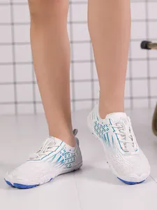 Detailed view of white non-slip kids water shoes for swimming and beach activities
