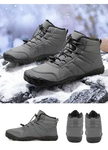 Grey winter snow boots with fleece lining and anti-slip thick soles shown in outdoor snow