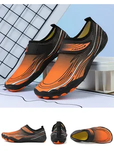 Viste dettagliate multi-angolo di scarpe da scoglio professionali in arancione e nero