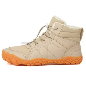 Warm beige winter snow boots with orange anti-slip sole and thick faux fur lining