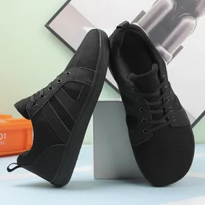 Black wide-toe barefoot training shoes shown in a stylish side-by-side arrangement