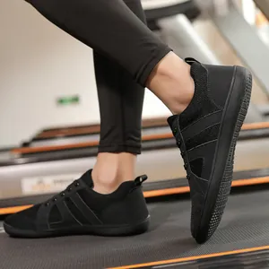 Men's wide-toe barefoot training shoes shown on a treadmill for running and fitness