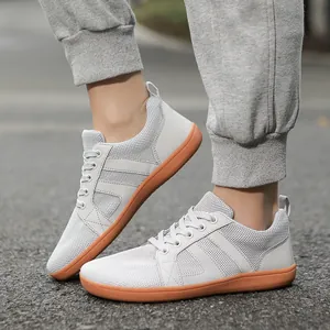 Lightweight grey barefoot shoes with wide toe box for cross-training and running