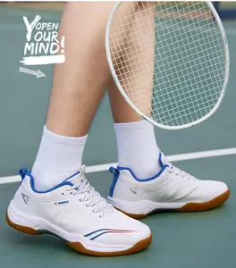 Vue détaillée des chaussures de badminton professionnelles blanches et bleues d'homme