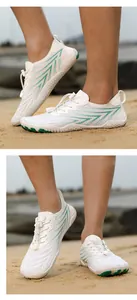 White outdoor water shoes with quick-dry mesh and non-slip rubber soles for beach use.