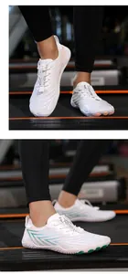 Detailed view of quick-dry white five-finger wading shoes with elastic laces.