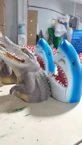 Detailed view of the sharp teeth and blue finish of the resin great white shark garden art.