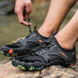 Breathable mesh outdoor wading shoes for hiking and rafting shown on river rocks