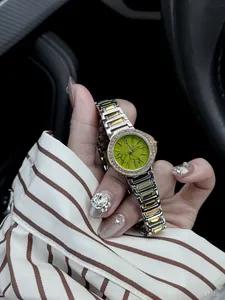 Close-up of Scottie quartz watch with green marble dial and rhinestone bezel