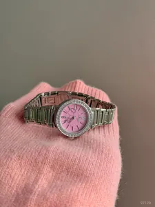 Scottie 9712b women's watch with pink marble dial and rhinestone bezel detail