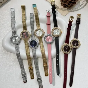 Detail view of Scottie diamond wreath watches with leather and mesh bands