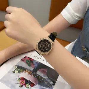 Luxurious Scottie 9136 women's three-eye chronograph watch with crocodile leather strap on wrist
