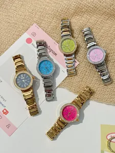 Close-up of Scottie luxury women's watches with marble pattern dials and rhinestone bezels