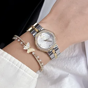 Close-up of Scottie luxury women's octagonal watch with honeycomb dial and diamond bezel