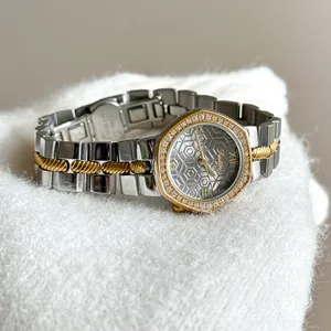 Close-up of Scottie luxury women's watch with octagonal diamond-set bezel and honeycomb dial