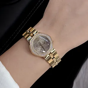 Close-up of luxury gold Scottie women's watch with octagonal rhinestone bezel