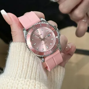 Close-up of pink Scottie 3013 quartz watch featuring rotating bezel and silicone strap
