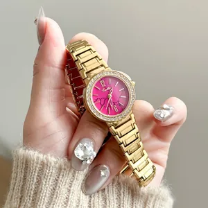 Luxury Scottie gold stainless steel watch with pink marble dial and rhinestone bezel
